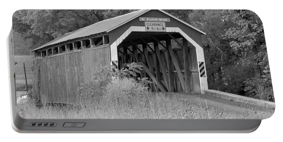 Mt Pleasant Covered Bridge Portable Battery Charger featuring the photograph Mt. Pleasant Covere Bridge Through The Grass Black And White by Adam Jewell