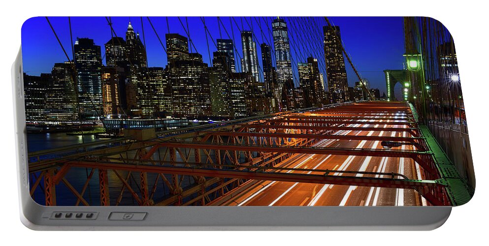 Nyc Portable Battery Charger featuring the photograph New York Skyline from the Brooklyn Bridge by Clint Buhler