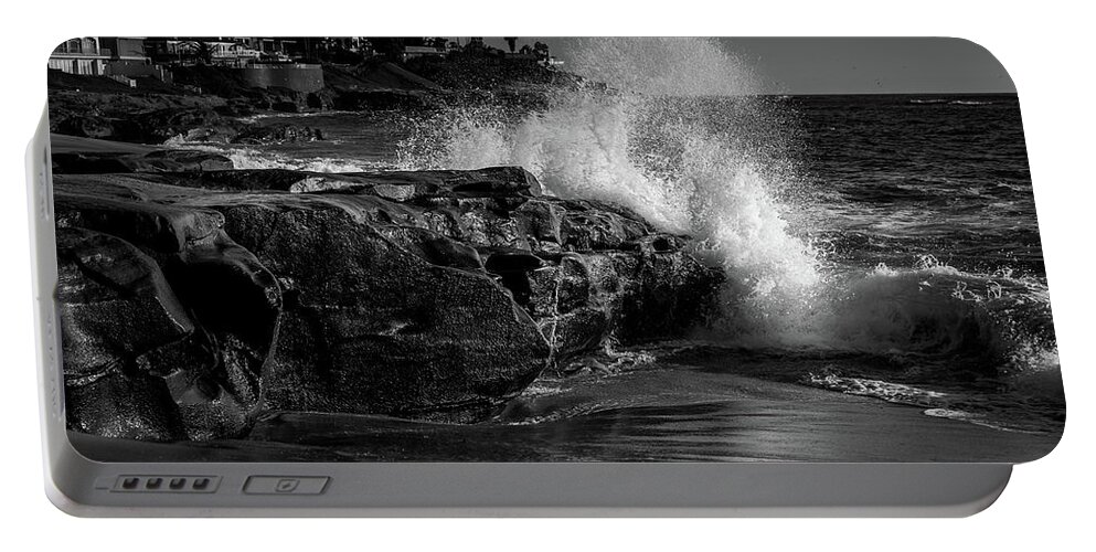 Beach Portable Battery Charger featuring the photograph Ocean Sprays by Aaron Burrows