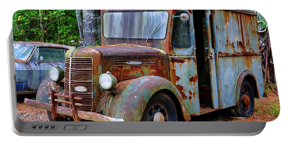 Abandoned Portable Battery Charger featuring the photograph Old Mack Delivery Van by Darryl Brooks