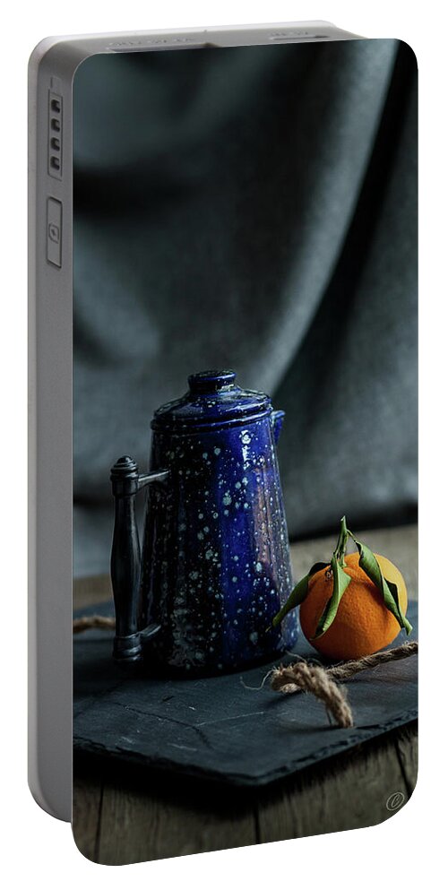 Fotofoxes Portable Battery Charger featuring the photograph Orange Tea by Alexander Fedin
