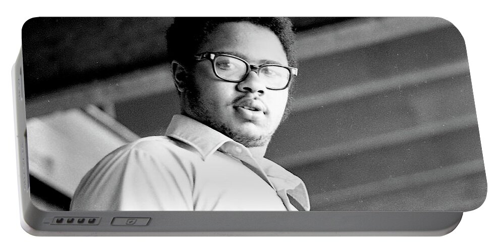 Phoenix Portable Battery Charger featuring the photograph Perturbed High School Student, with Substantial Eyeglasses, 1972 by Jeremy Butler