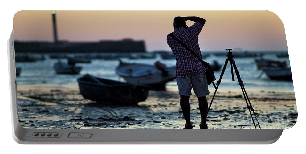 Space Portable Battery Charger featuring the photograph Photographer at la Caleta Beach Cadiz Spain by Pablo Avanzini