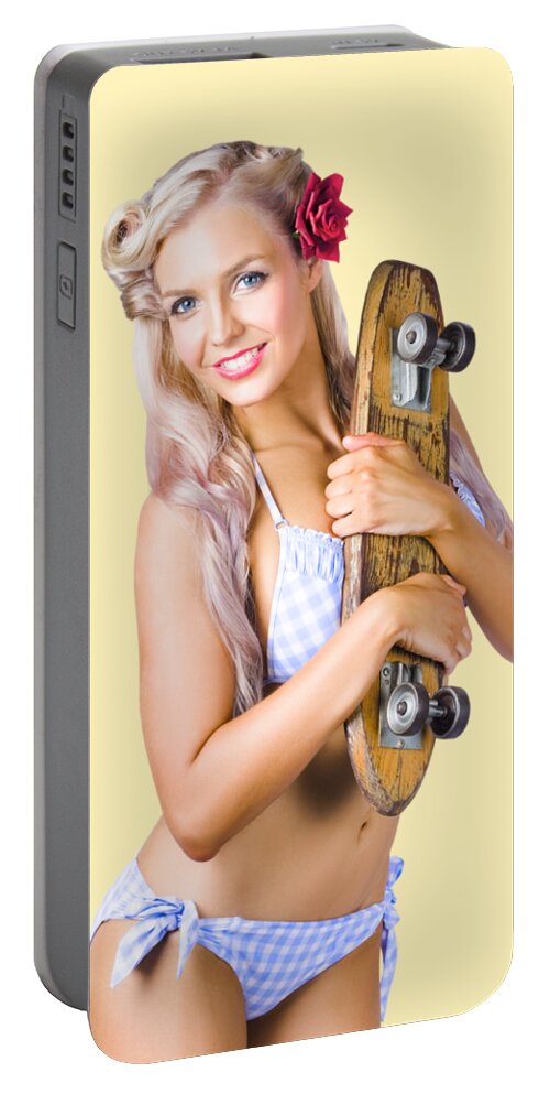 Skate Portable Battery Charger featuring the photograph Pinup woman in bikini holding skateboard by Jorgo Photography