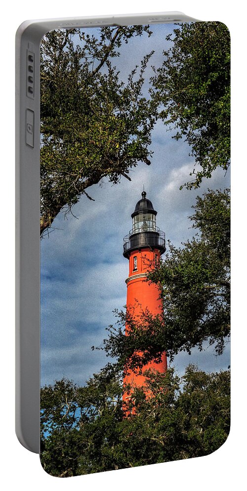 Barberville Roadside Yard Art And Produce Portable Battery Charger featuring the photograph Ponce Inlet Lighthouse by Tom Singleton
