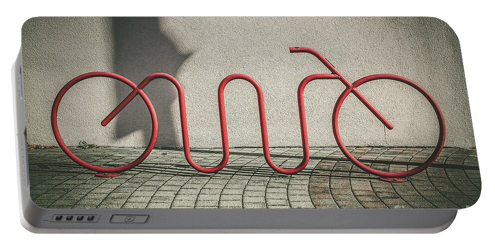 Red Bank Bike Portable Battery Charger featuring the photograph Red Bike Rack by Colleen Kammerer
