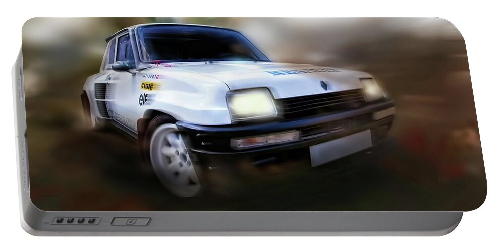 Wheels Portable Battery Charger featuring the photograph Renault 5 GT Kicking up dust by Carl H Payne