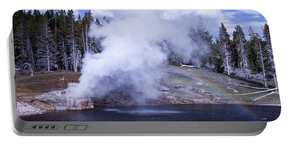 Geyser Portable Battery Charger featuring the photograph Riverside Geyser and Rainbow by Rick Pisio