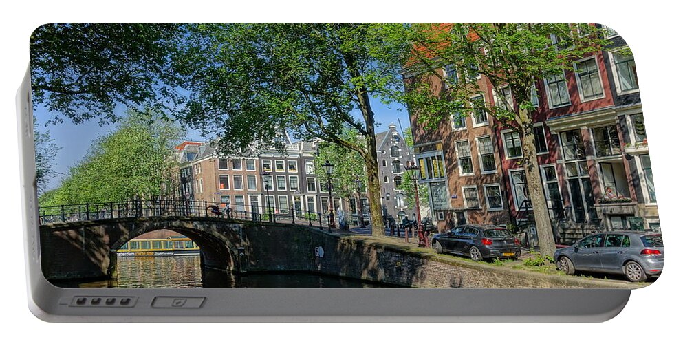 Canal Portable Battery Charger featuring the photograph Tree Lined Canal in Amsterdam by Patricia Caron