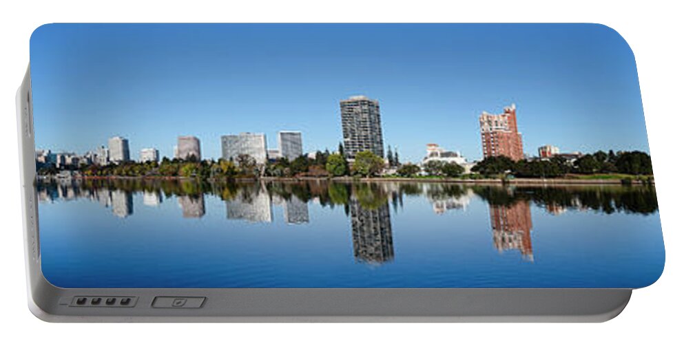 Photography Portable Battery Charger featuring the photograph Skyline Of Oakland And Lake Merritt by Panoramic Images