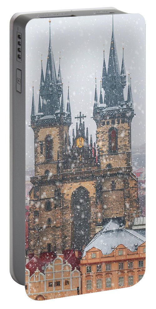 Jenny Rainbow Fine Art Photography Portable Battery Charger featuring the photograph Snowy Prague. Church Of The Virgin Mary Before Tyn by Jenny Rainbow