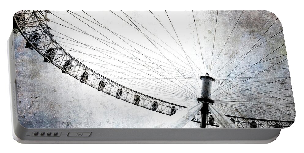 Photography Portable Battery Charger featuring the photograph Spinning Wheel Iv by Golie Miamee