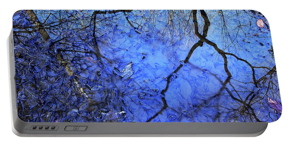 Water Portable Battery Charger featuring the photograph Spring Puddle Abstract by Mike Eingle