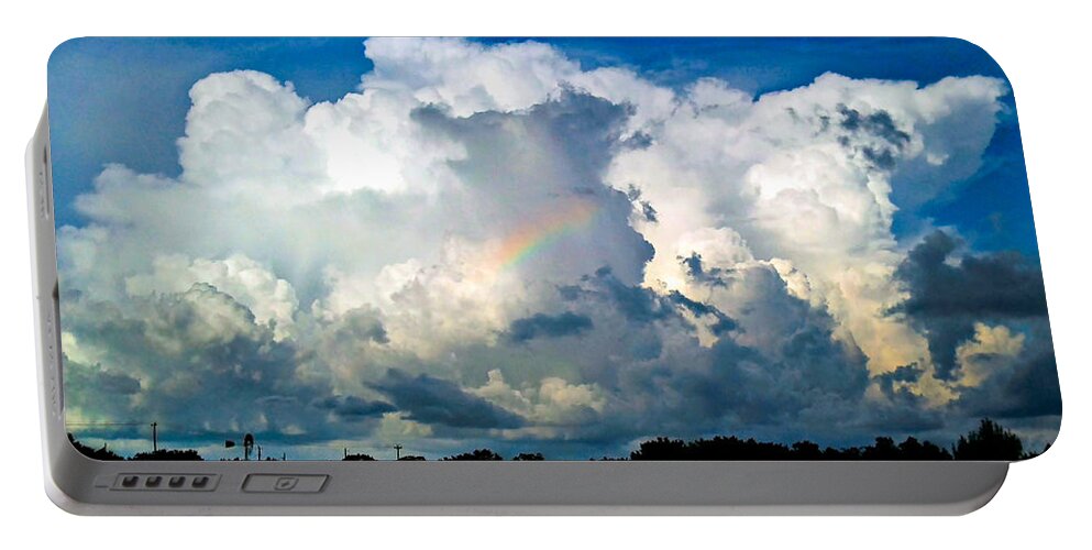 Sky Portable Battery Charger featuring the photograph Storm and Rainbow by Ivars Vilums