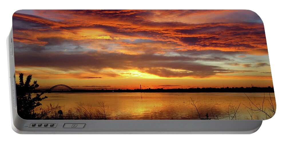 Sunset Portable Battery Charger featuring the photograph Sunset on the Delaware No. One by Linda Stern