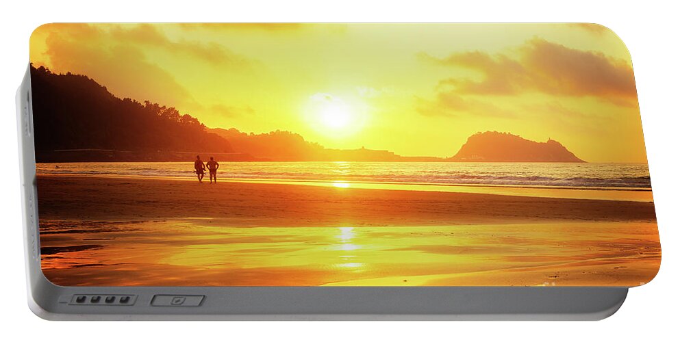 Zarautz Portable Battery Charger featuring the photograph sunset in Zarauz by Anastasy Yarmolovich