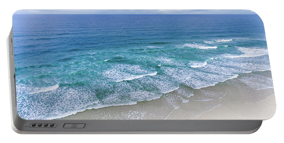 1x1 Portable Battery Charger featuring the photograph The Atlantic Rolling At The Beach by Hannes Cmarits