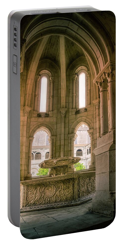 Renaissance Portable Battery Charger featuring the photograph The fountain in the cloister of silence by Micah Offman