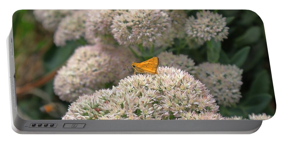 Flora Portable Battery Charger featuring the photograph The Little Skipper by Steven Gordon