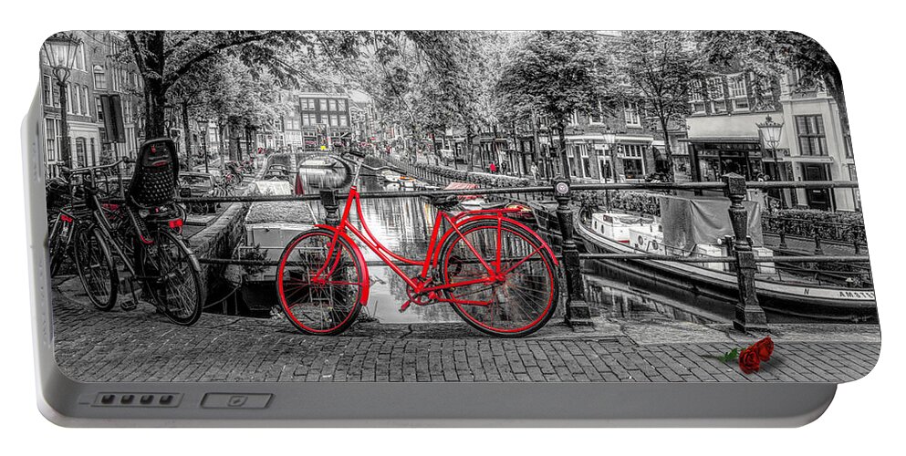 Boats Portable Battery Charger featuring the photograph The Red Bike in Amsterdam in Color Selected Black and White by Debra and Dave Vanderlaan