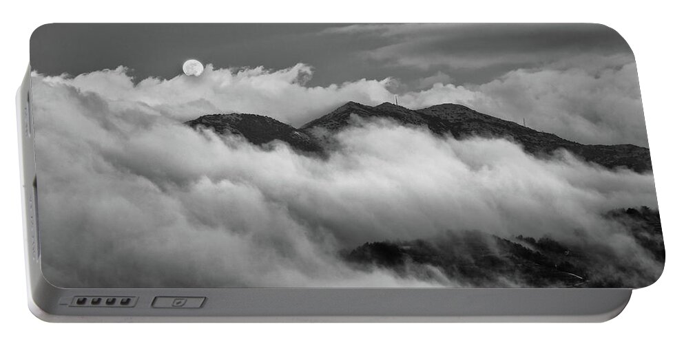 Cloud Portable Battery Charger featuring the photograph The rising of full moon by Michalakis Ppalis