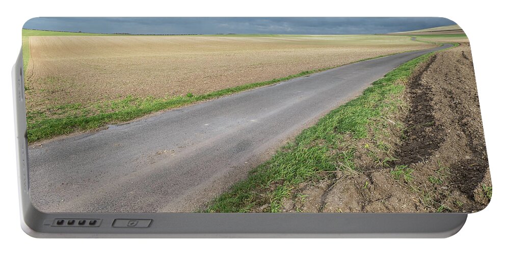 Calais Region Portable Battery Charger featuring the photograph The Road Between The Fields by Inge Elewaut
