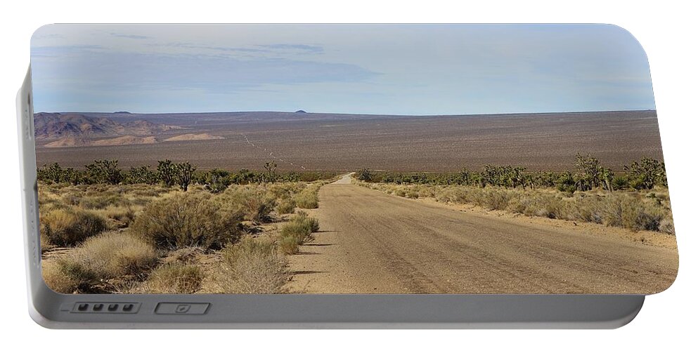 Mojave National Preserve Portable Battery Charger featuring the photograph The Road Less Traveled by Maria Jansson