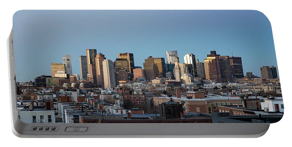 America Portable Battery Charger featuring the photograph The skyline of Boston in Massachusetts, USA on a clear Winter ev by Kyle Lee