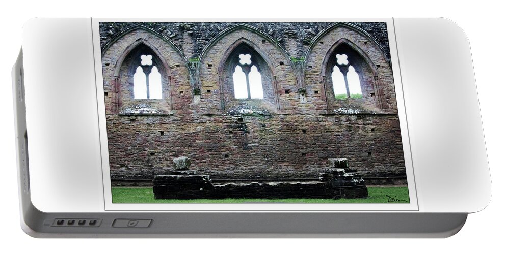 Tintern Abbey Portable Battery Charger featuring the photograph Three Arches at Tintern Abbey by Peggy Dietz