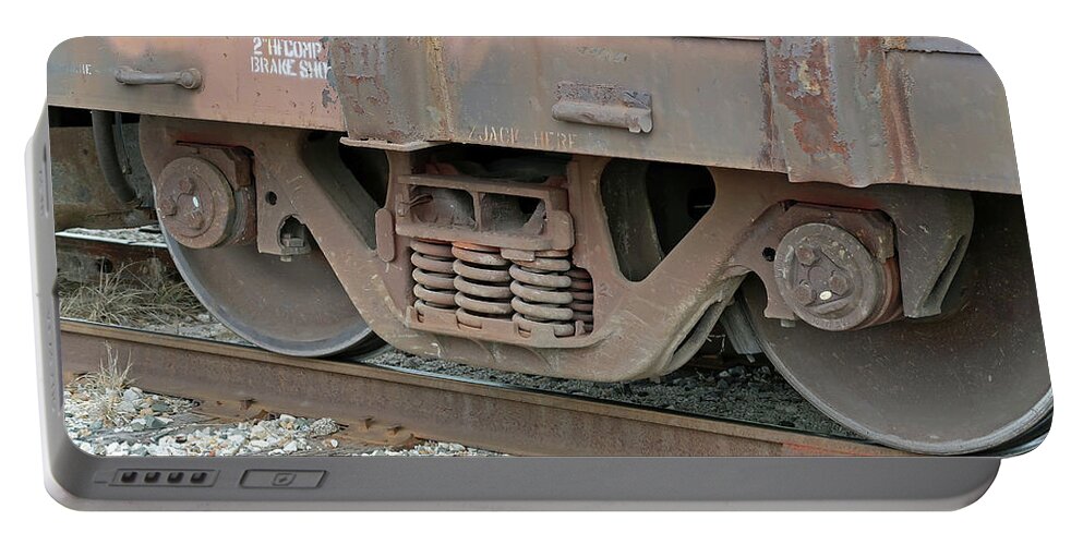 Train Wheels On Track Portable Battery Charger featuring the photograph Train Wheels on Track by Connie Fox
