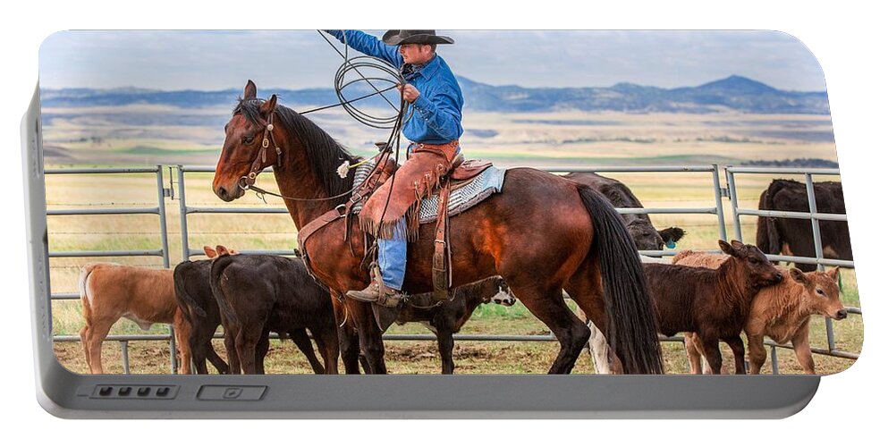 Cowboy Portable Battery Charger featuring the photograph Tugging by Todd Klassy