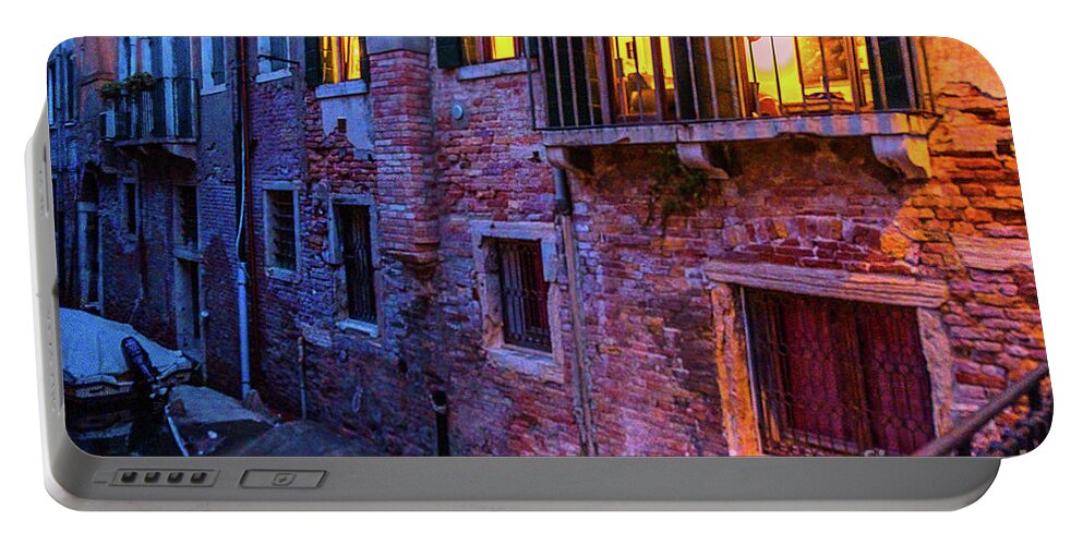 Venice Windows At Night By Marina Usmanskaya Portable Battery Charger featuring the photograph Venice windows at night by Marina Usmanskaya