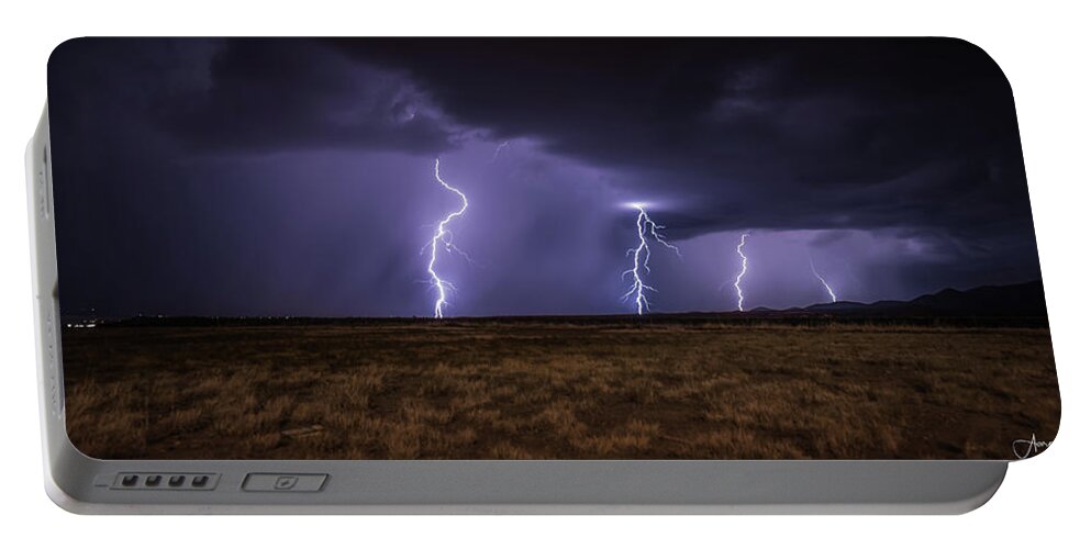 Lightning Portable Battery Charger featuring the photograph Walking the Line by Aaron Burrows