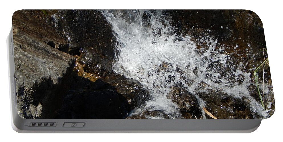 Fountain Portable Battery Charger featuring the photograph Waterfall in the garden and water fountains by Oleg Prokopenko