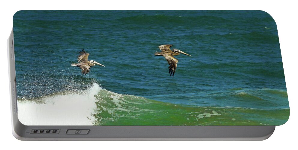 Pelicans Portable Battery Charger featuring the photograph Wave Runners by Scott Cameron