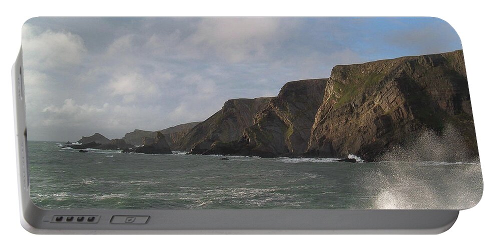 Waves Portable Battery Charger featuring the photograph Waves Breaking Over Slipway Hartland Quay Devon by Richard Brookes