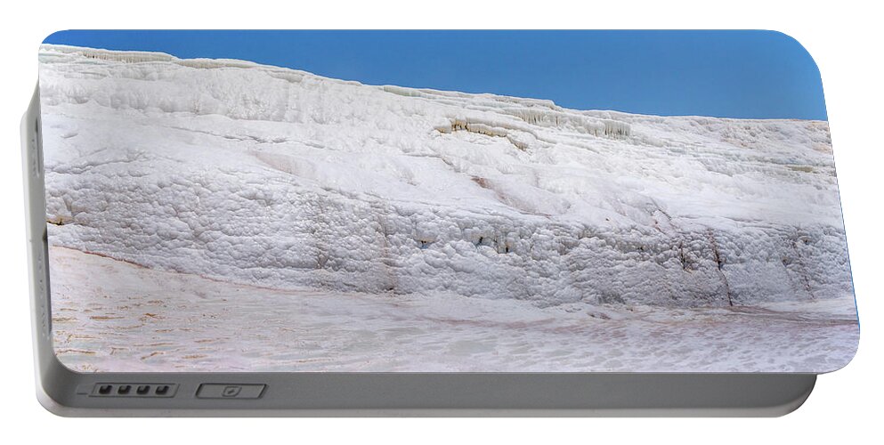 Turkey Portable Battery Charger featuring the photograph Wet white limestone formations in Pamukkale by Sun Travels