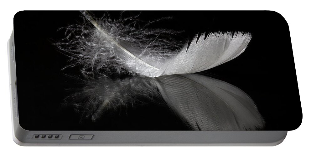 Feather Portable Battery Charger featuring the photograph White Feather Reflection by Tom Mc Nemar