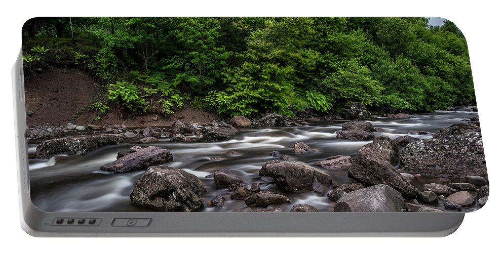 Background Portable Battery Charger featuring the photograph Wild Mountain River Streaming Through Green Forest in Scotland by Andreas Berthold