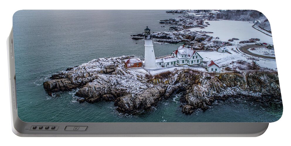 Portland Portable Battery Charger featuring the photograph Winter At Portland Head Light by Veterans Aerial Media LLC
