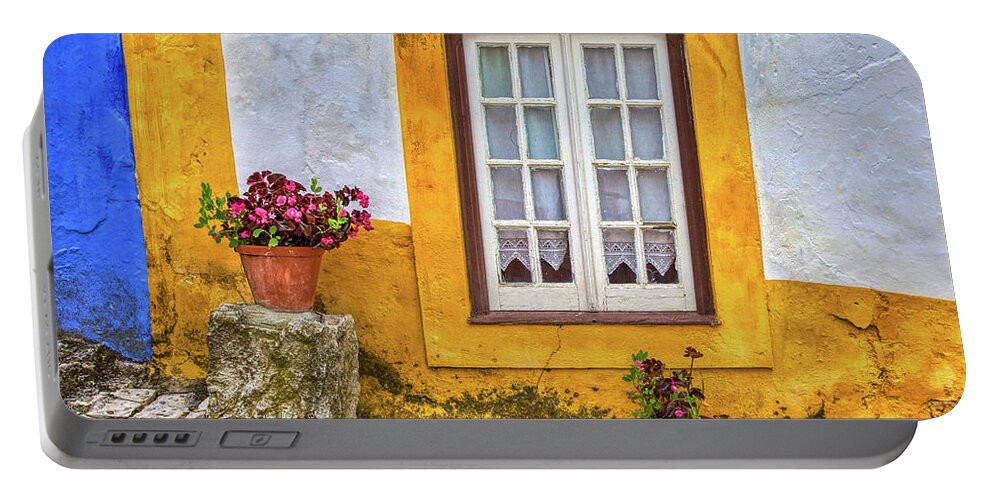 Window Portable Battery Charger featuring the photograph Yellow Window of Obidos by David Letts