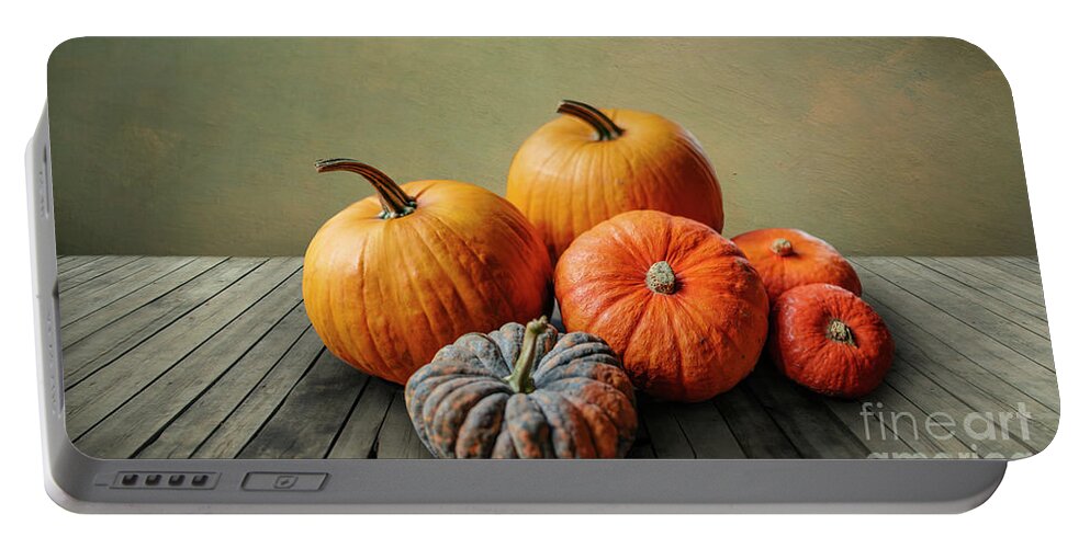 Thanksgiving Portable Battery Charger featuring the photograph Autumn pumpkins still life on vintage wooden table and rustic ba #3 by Jelena Jovanovic