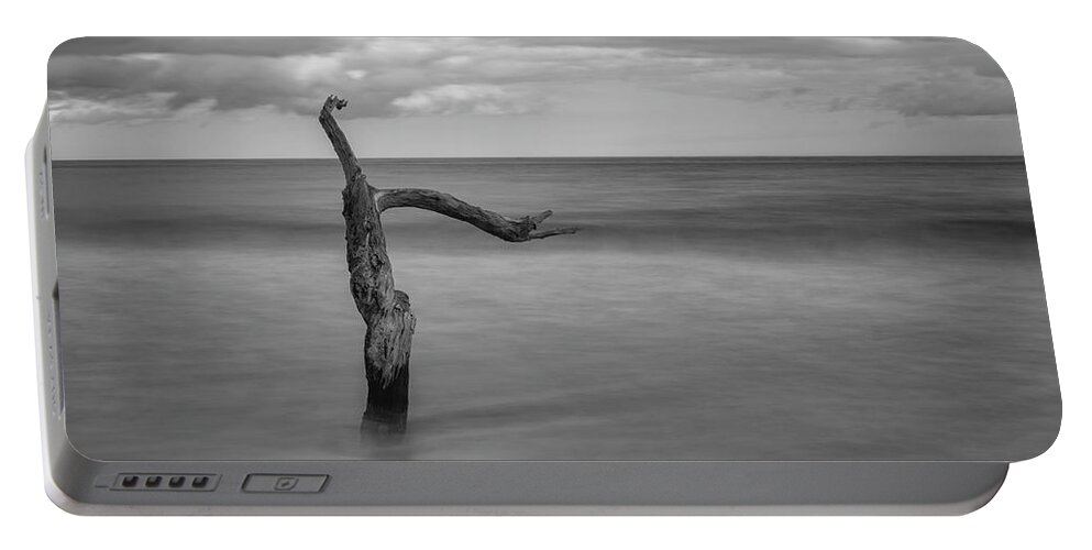 Black Portable Battery Charger featuring the photograph Driftwood Beach in Black and White by Carolyn Hutchins
