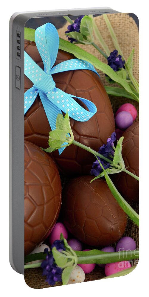 Blue Portable Battery Charger featuring the photograph Happy Easter chocolate eggs #1 by Milleflore Images