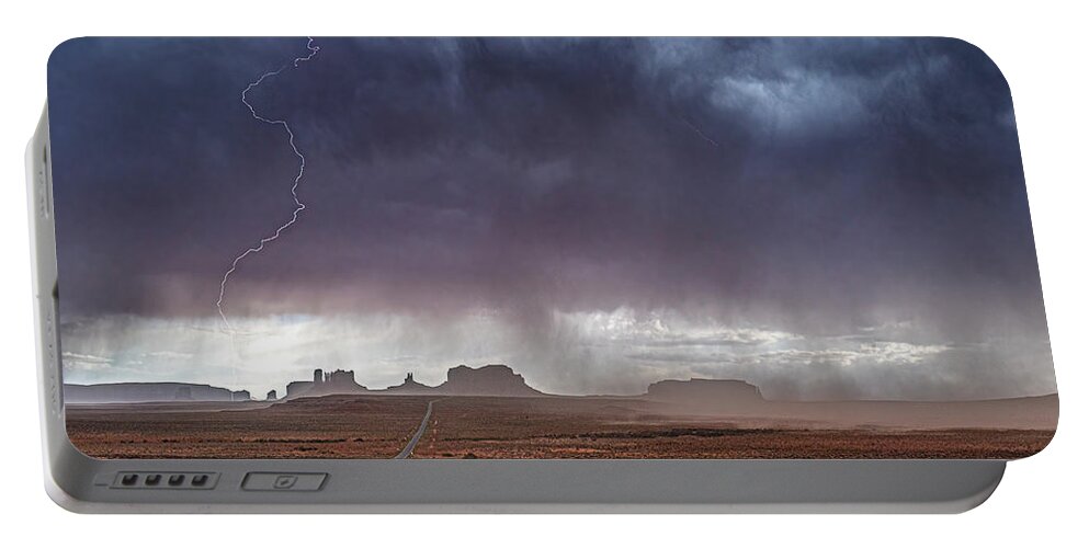 © 2022 Lou Novick All Rights Reversed Portable Battery Charger featuring the photograph Monument Valley Storm #1 by Lou Novick