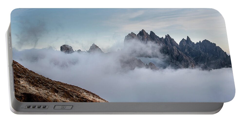 Italian Alps Portable Battery Charger featuring the photograph Mountain landscape with fog in autumn. Tre Cime dolomiti Italy. by Michalakis Ppalis