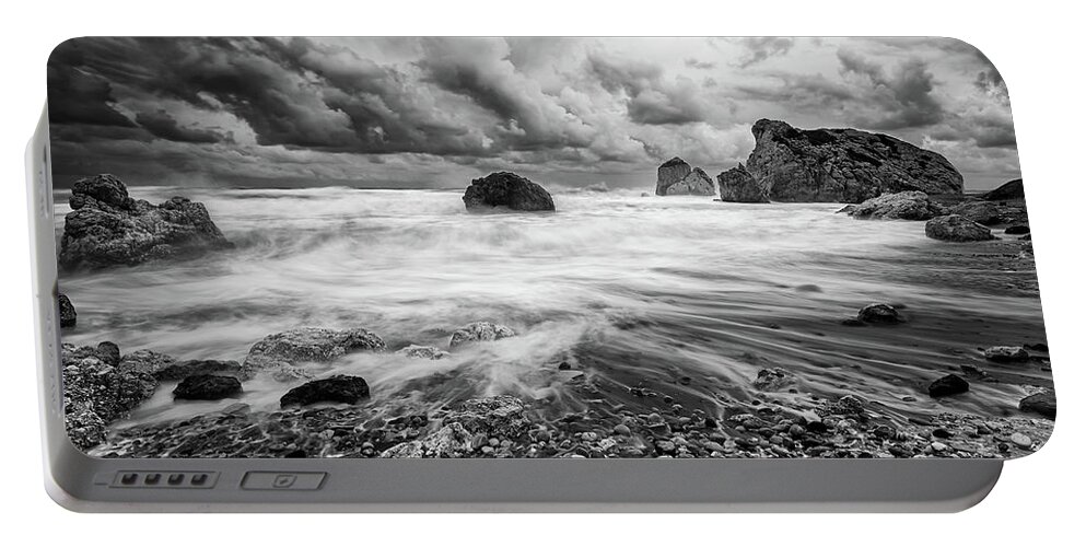 Seascape Portable Battery Charger featuring the photograph Seascape with windy waves during storm weather at the a rocky co #3 by Michalakis Ppalis