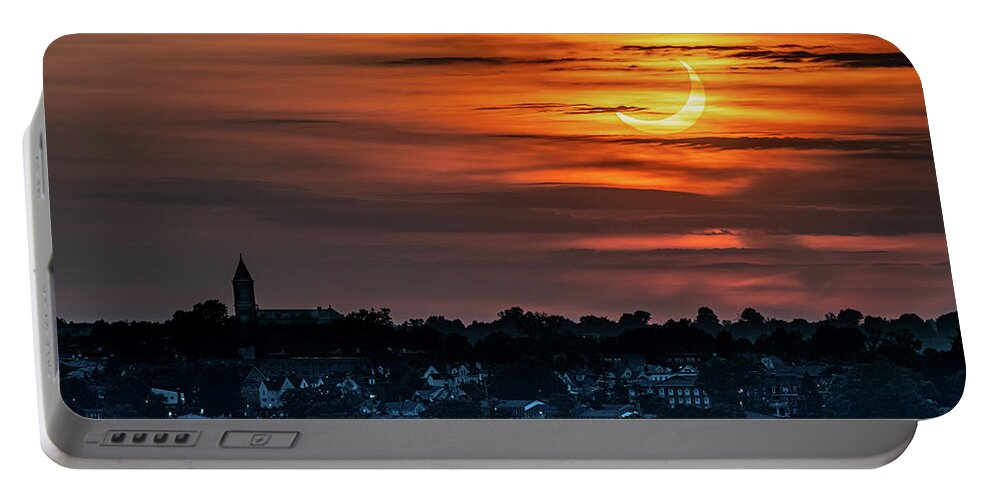 New York Portable Battery Charger featuring the photograph Solar eclipse over Yonkers by Kevin Suttlehan