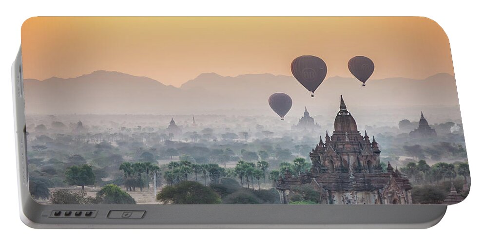 Sunrise Portable Battery Charger featuring the photograph Sunrise at Bagan by Arj Munoz