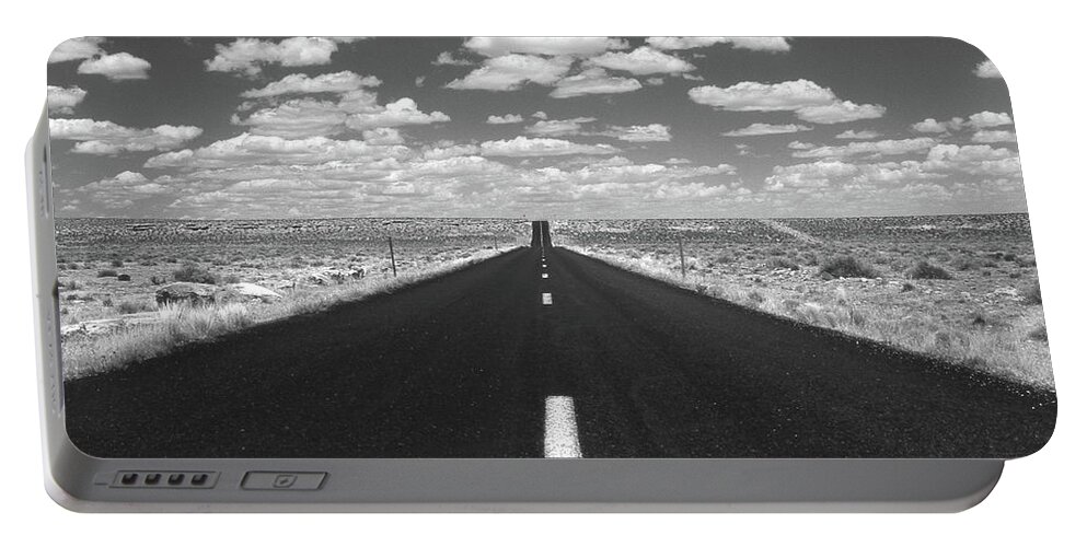 Highway Portable Battery Charger featuring the photograph The Highway by Mike McGlothlen